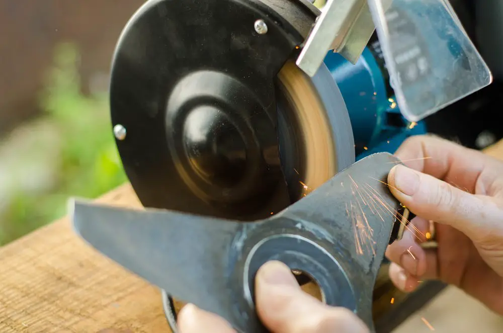 How to Sharpen Lawn Mower Blades with a Bench Grinder